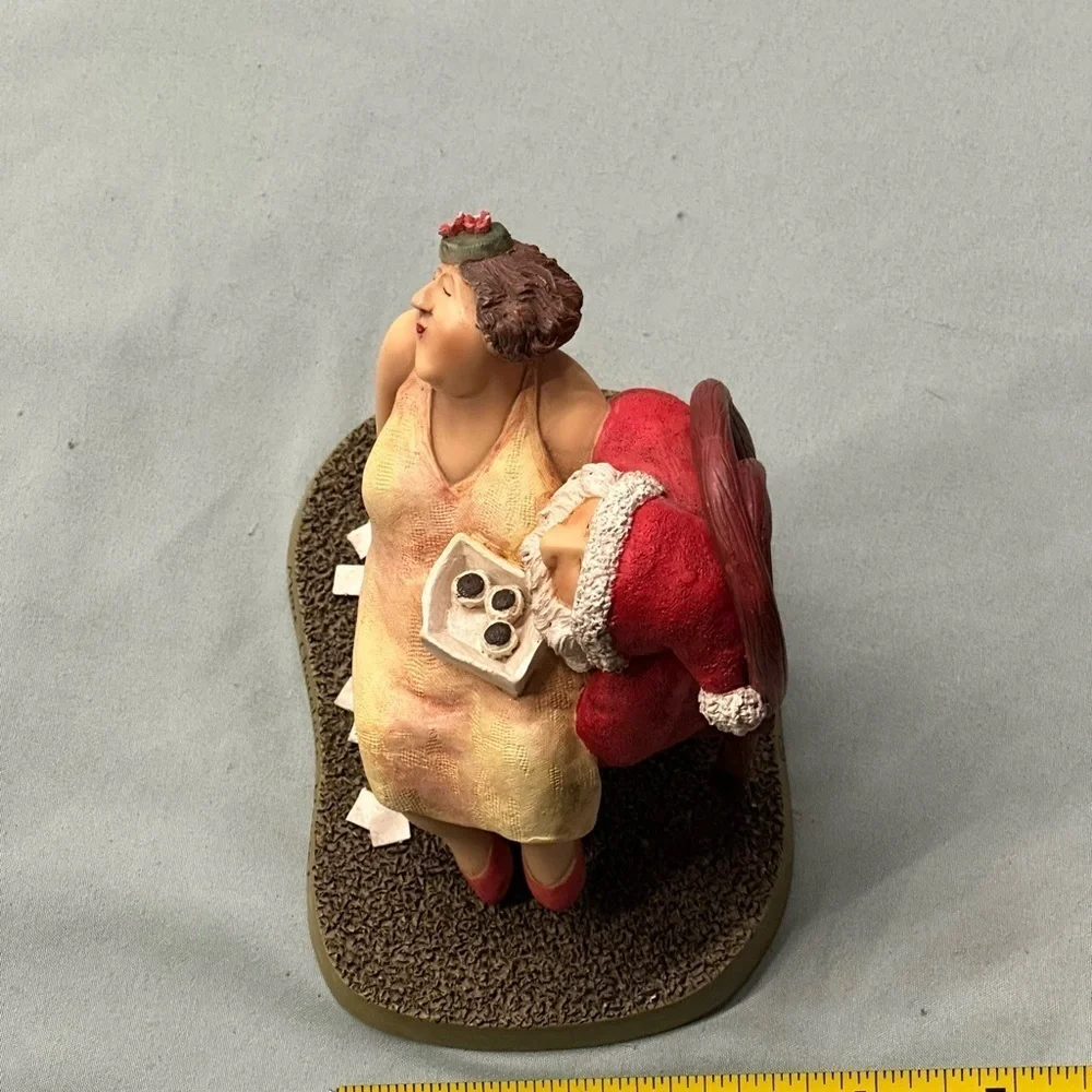 “More Chocolate Please” Santa figure numbered, from the Real People Collection.